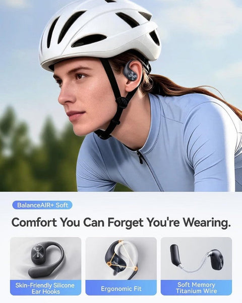 A woman wearing a white bicycle helmet and a light blue cycling jersey is shown outdoors, with a small black in-ear earpiece visible in her ear. The lower portion includes feature callouts for BalanceAIR+ Soft ear hooks, ergonomic fit, and soft memory titanium wire, with three small product detail thumbnails.