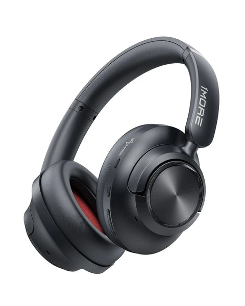 Black over-ear wireless headphones with a metallic silver circular accent on the earcup and a red inner earpad, shown on a plain white background. The brand name 'iMORE' is visible on the headband.