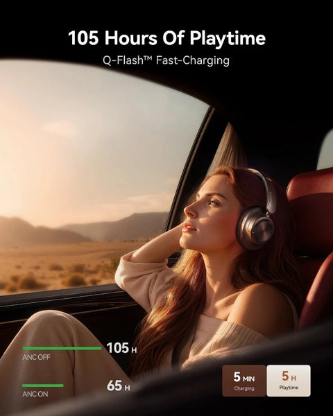 A woman wearing over-ear headphones sits in a car interior, looking out the window at a sunset. The image includes marketing text reading '105 Hours Of Playtime' and 'Q-Flash Fast Charging,' plus battery icons indicating 105 hours and 5W charging.